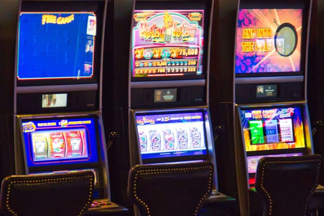 Image of four slot machines in a Las Vegas casino.